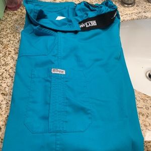 Scrubs size sx teal color